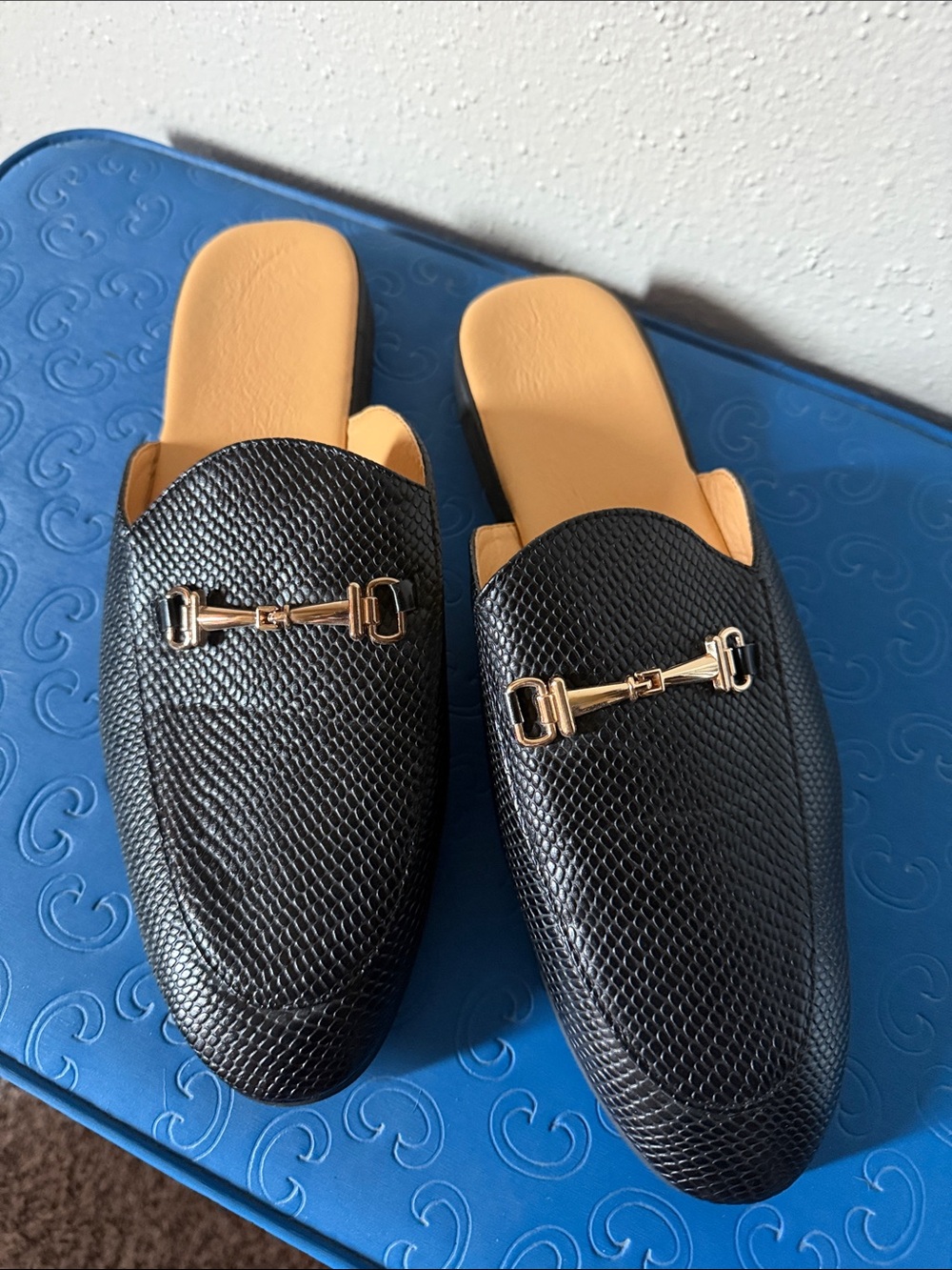 Black Textured Backless Loafers with Gold Bit Detail